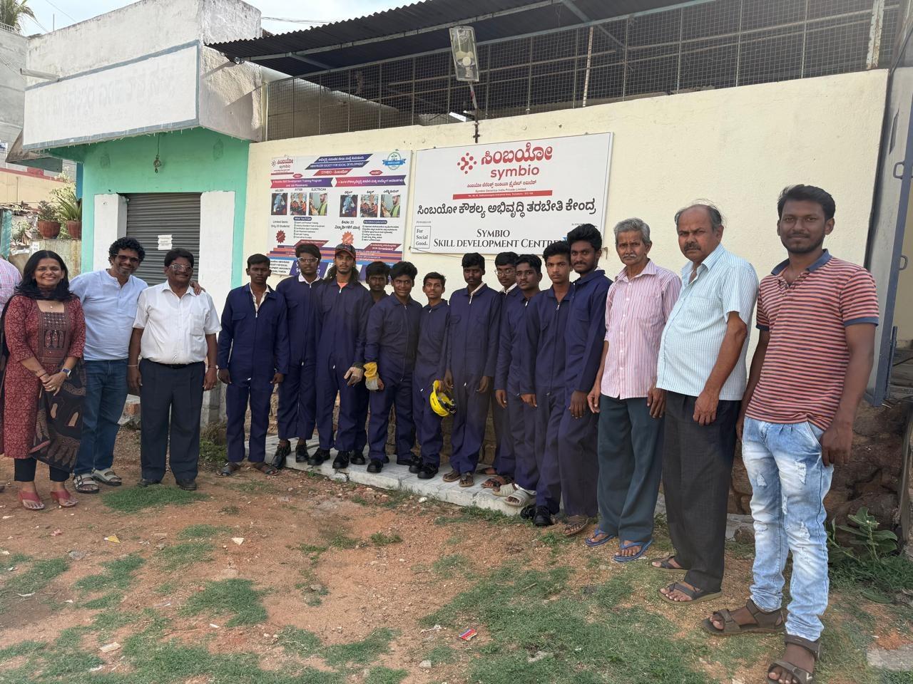 Trainees outside the Symbio Skill Development Centre in Tumkur